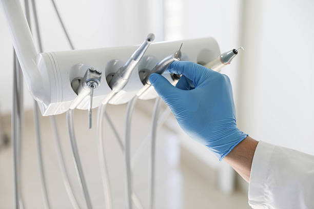 Professional Tooth Extraction technician working in Olivet, TN
